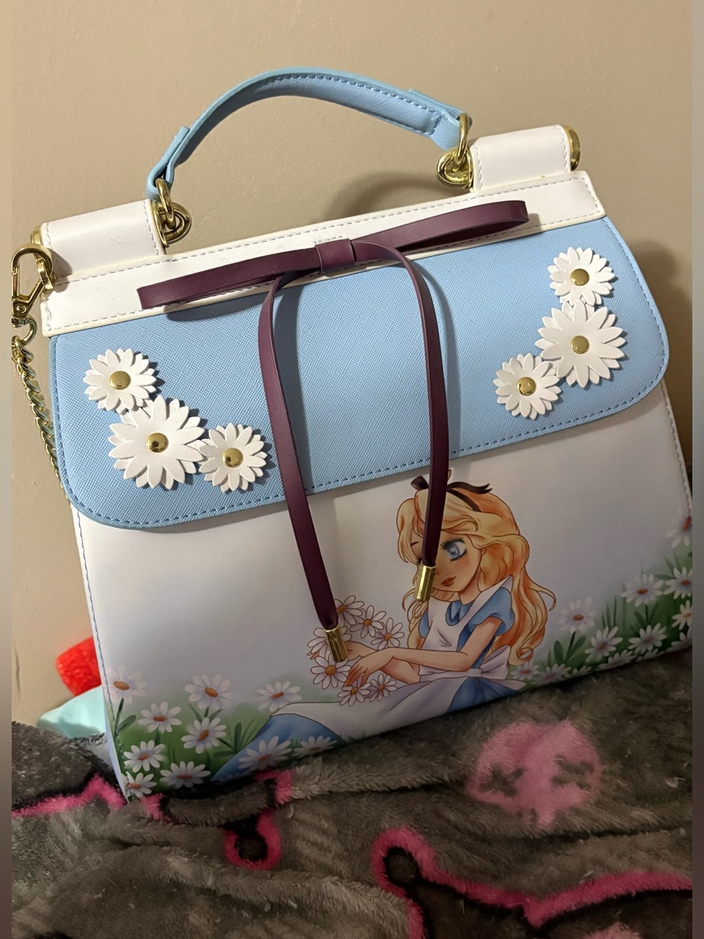 Loungefly Light Blue and White Daisy Accent Crossbody with Purple Bow Strap